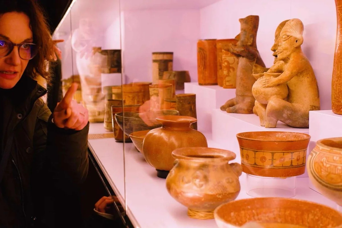 Pre-Columbian cacao vessels in a display case at the Choco-Story chocolate museum, a fun museum in Paris
